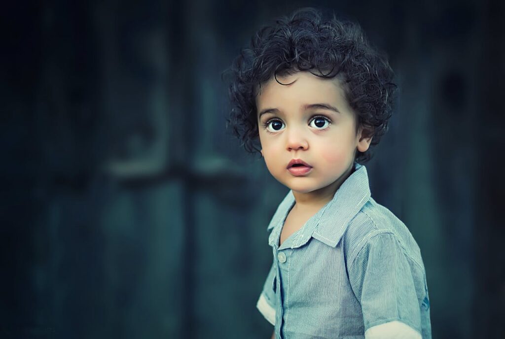 child-children-girl-happy Toddle Wearing Gray Button Collared Shirt With Curly Hair
