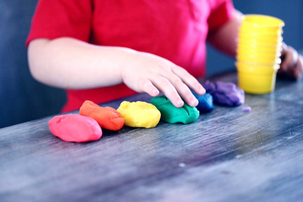 pexels-photo-1449934 Person Making Clay Figures